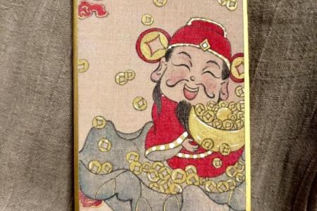 财神在元宝上面成语